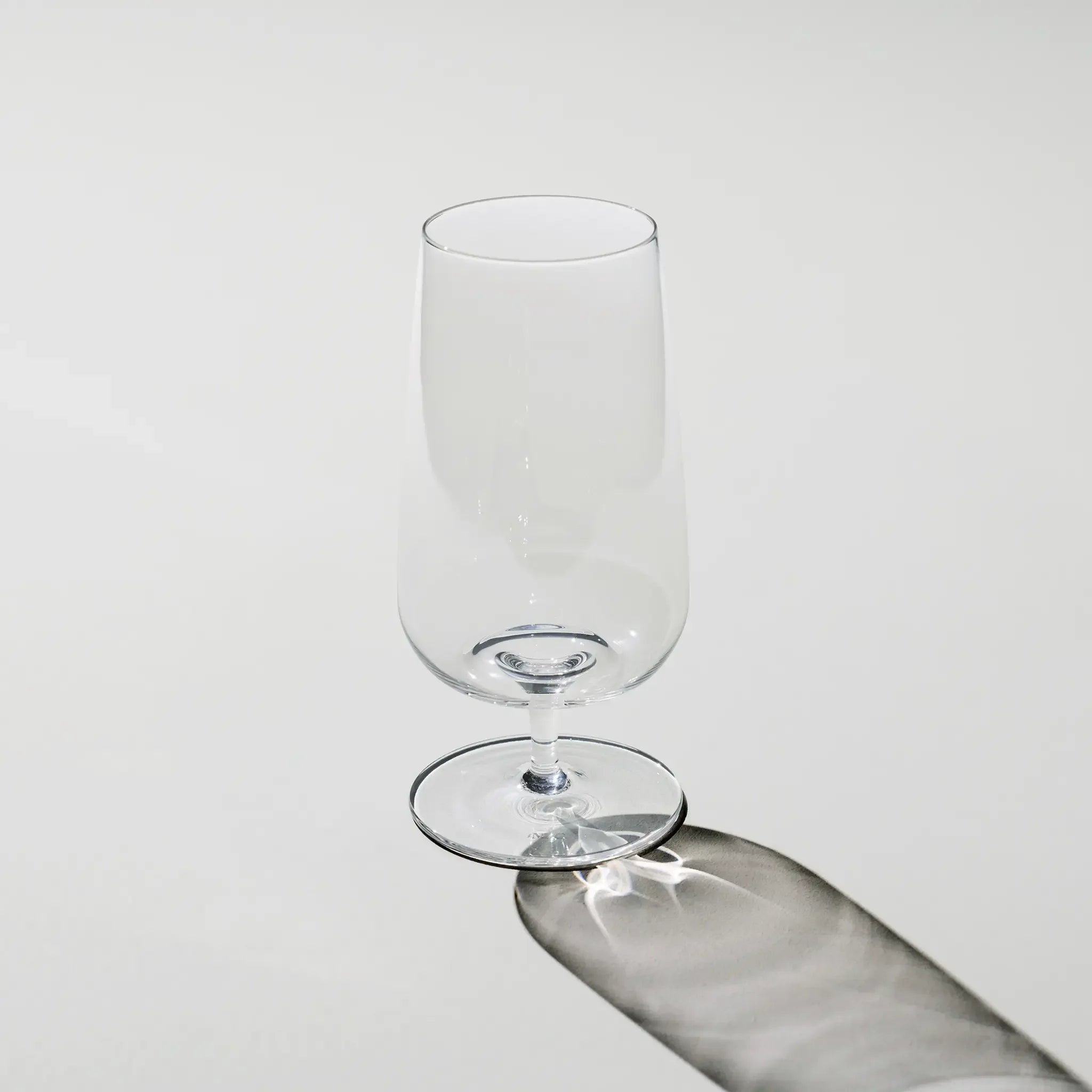 Empty Brewer’s Beer Glass – tall and elegant beer glass with stem, designed to enhance aroma and clarity of pilsners and lagers.
