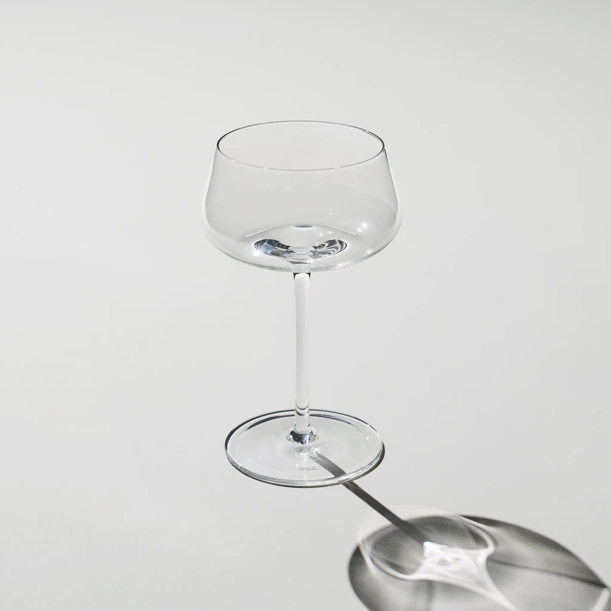 Empty Beyond Bubbly Coupe – wide champagne coupe with ultra-slim stem, elegant silhouette and refined balance, from The Mancave.